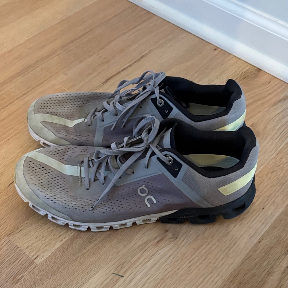On Running Taupe and Black Sneakers